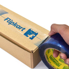 Roll of blue tape with Flipkart lFreeHitt Ecommerce for shipping purposes.